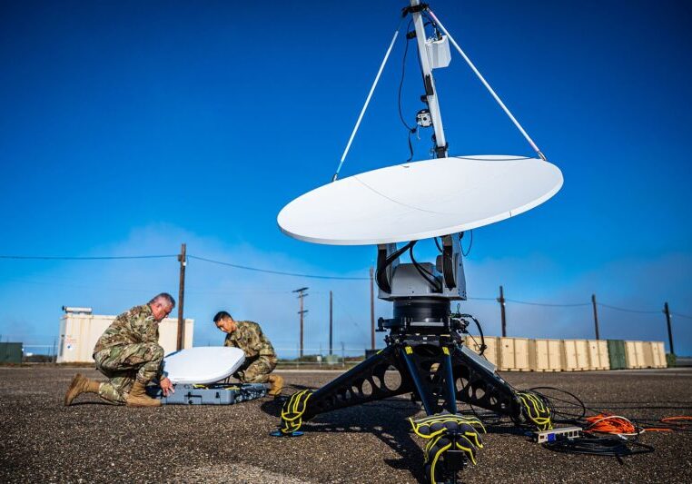 Two members of the 216th Space Control Squadron (SPCS) set up antennas as part of a ‘Honey Badger System’ during BLACK SKIES 22 at Vandenberg Space Force Base, Calif., Sept. 20, 2022. The 216 SPCS specializes in electromagnetic warfare and is participating in the Space Training and Readiness Command’s (STARCOM) BLACK SKIES 22, along with numerous other units spanning from California to Colorado. The first of its kind, BLACK SKIES 22 is a live simulation exercise designed to rehearse the command and control of multiple joint electronic warfare fires. (U.S. Space Force photo by Tech. Sgt. Luke Kitterman)