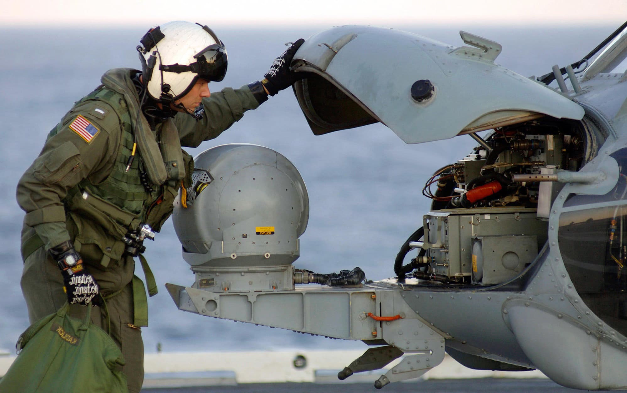 HFD47A 070320-N-2984R-003
ATLANTIC OCEAN (March 20, 2007) D Lt. j.g. Richard Kadlick assigned to Anti-Submarine Helicopter Squadron (HS) 7 performs a post-flight inspection on a SH-60 Seahawks aboard the Nimitz-class aircraft carrier USS Harry S. Truman (CVN 75). Truman is underway conducting Tailored Ship's Training Availability (TSTA). U.S. Navy photo by Mass Communication Specialist 3rd Class Ricardo J. Reyes (RELEASED) SH-60 Sea Hawk Anti-Submarine Helicopter Squadron nose