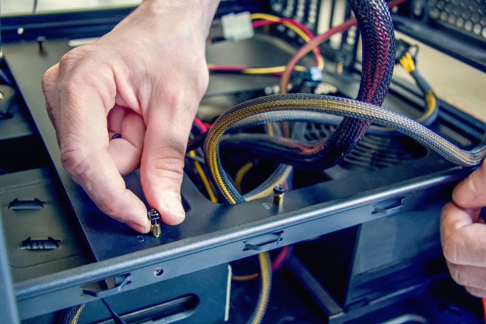 Selective,Focus.,Assembling,A,Personal,Desktop,Computer.,Installing,The,Power